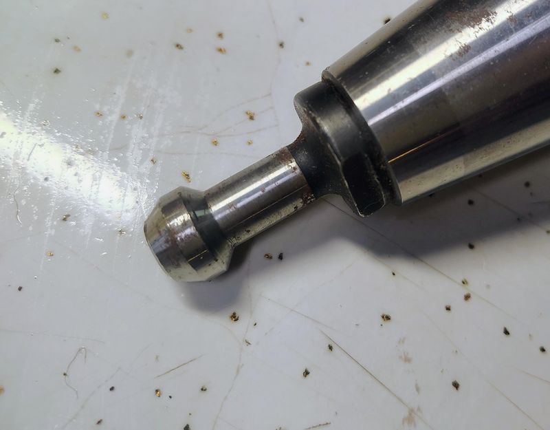 Pull stud threaded into the back of a CAT40 tool holder taper