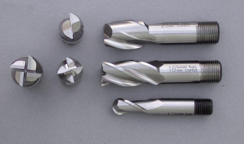 Two-flute, four-flute, and ball nose end mills with end views
